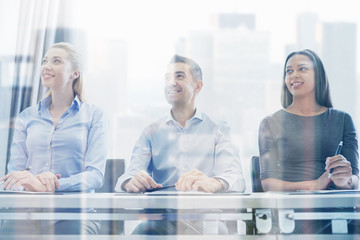 smiling business people meeting in office