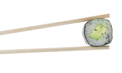 Sushi roll in chopsticks isolated on white background