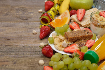 Various fruits on a wooden background
