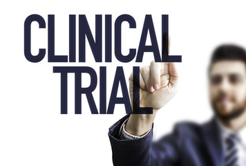 Business man pointing the text: Clinical Trial