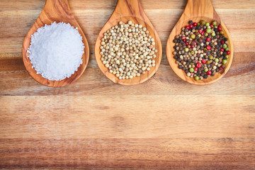 Spices and sea salt in spoons