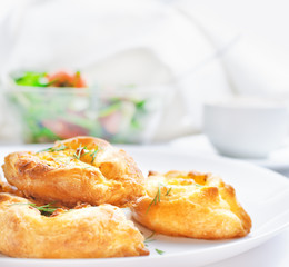 baked pies with mozzarella and dill