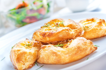 baked pies with mozzarella and dill