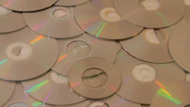 compact disc scattered on the floor