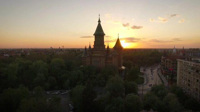 European city skyline seen by a professional drone at sunset