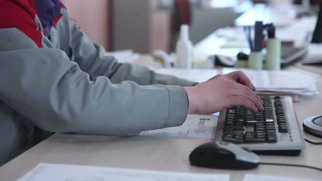 Engineer is Working on computer, typing on keyboard. HD.