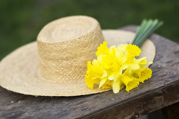 Easter flower and straw hat in sping