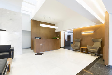 Reception area with wooden reception desk