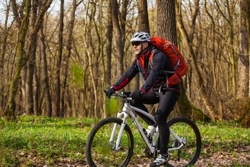 Fototapeta premium Mountain Bike cyclist riding single track