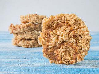 Rice crackers on Blue wooden floor.