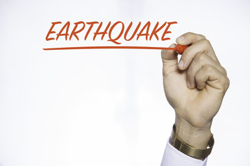 man writing earthquake