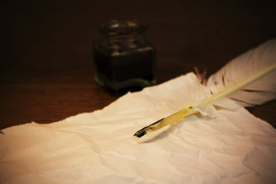 Feather quill pen with metal nib