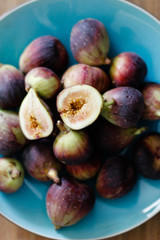 Fresh California figs on a blue plate