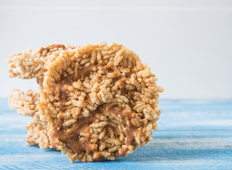 Rice crackers on Blue wooden floor.