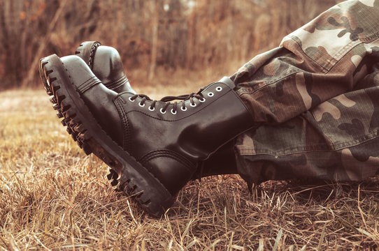 Man Wearing Black Leather Boots