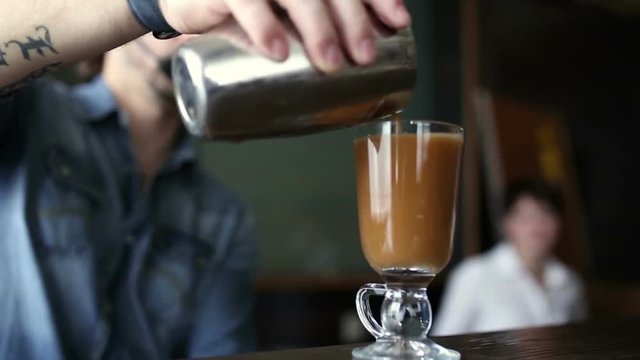 Barista shows a master class in cooking coffee