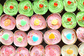 colorful cupcakes background.