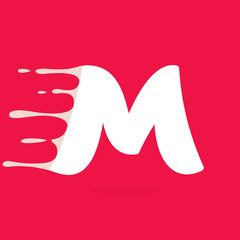 M letter logo made of milk.