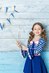 little girl clings to the marine network