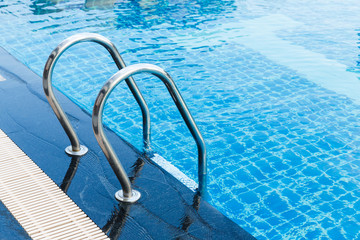 Swimming pool hand rails
