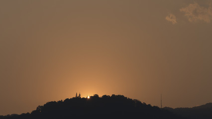 asian buddhist pagoda on mountain during sunset