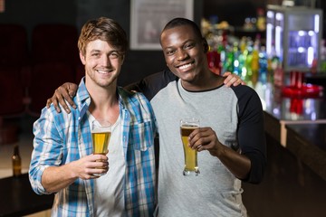 Happy friends having a drink