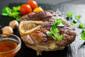 Fried piece of beef on the bone