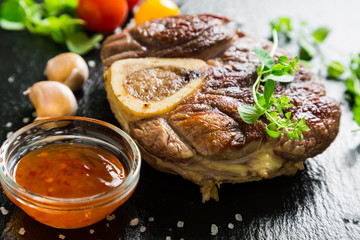 Fried piece of beef on the bone