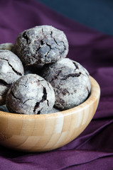 Chocolate shortbread cookies in wooden bowl