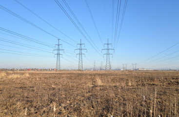 Power line in the countryside in the early spring.
