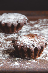 Two cakes sprinkled with powdered suga