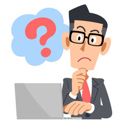 眼鏡をかけたビジネスマン　PC　 疑問

