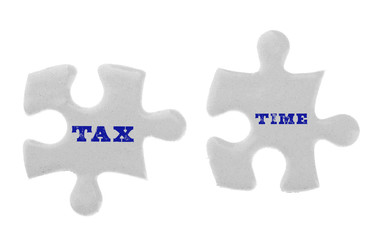 Tax Concept. White jigsaw puzzle isolated on white