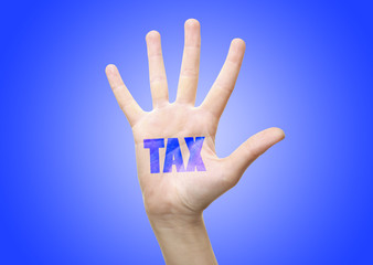 Obraz premium Tax concept. Woman's hand with Tax sign, on blue background