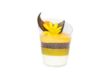 Fototapeta na wymiar mini canapes in plastic cups decorated with edible flowers