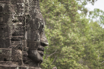 Fototapeta na wymiar Serenity stone carved face in Bayon temple, Angkor Thom, Cambodia