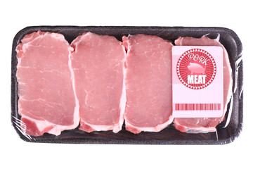 Packed pieces of pork meat, isolated on white