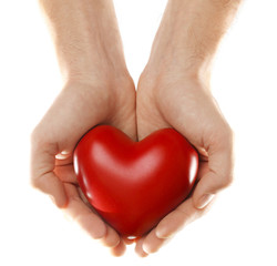 Decorative heart in male hands, isolated on white