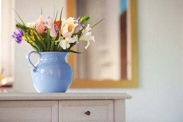 A bouquet of fresh flowers in a vase, close up