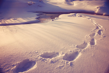 March on the creek snow ice water