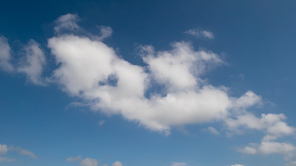 The white cloud with blue sky background.