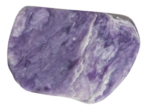 Small charoite pebble macro isolated on white