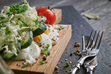 Healthy food and ingredients with tomato, cucumber, cabbage, gre