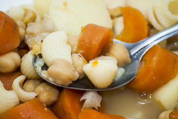 Vegetable soup with pasta, carrots and chickpeas