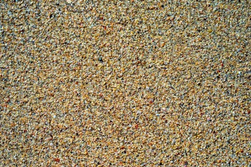 Sand at the beach as a textured background