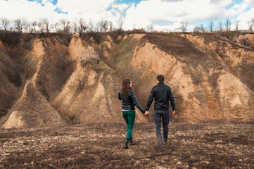  Happy couple smiling outdoors in the mountains