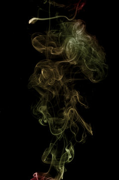 Colorful smoke on the black background