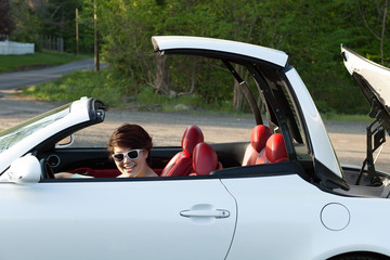 Woman Putting the Top Down