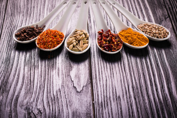 spices and herbs on wooden table , medicinal concept