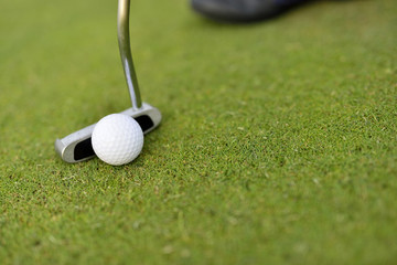 Young man playing golf